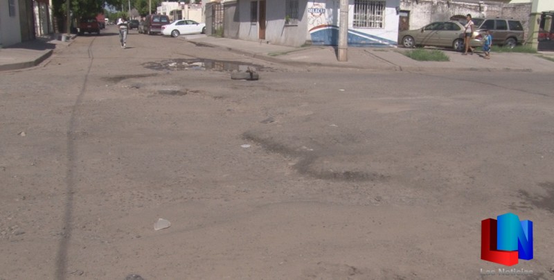 6 mil pesos por caer en baches.