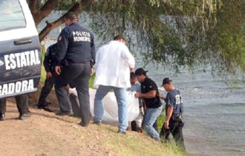 Encuentran cuerpo en canal