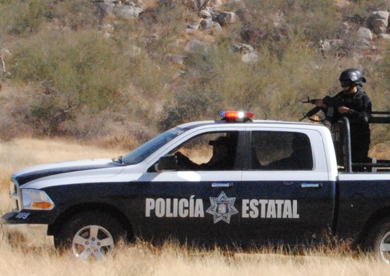 Encuentran cuerpo semienterrado