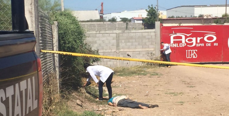 Encuentran a joven asesinado a balazos a espaldas de la Feria Ganadera