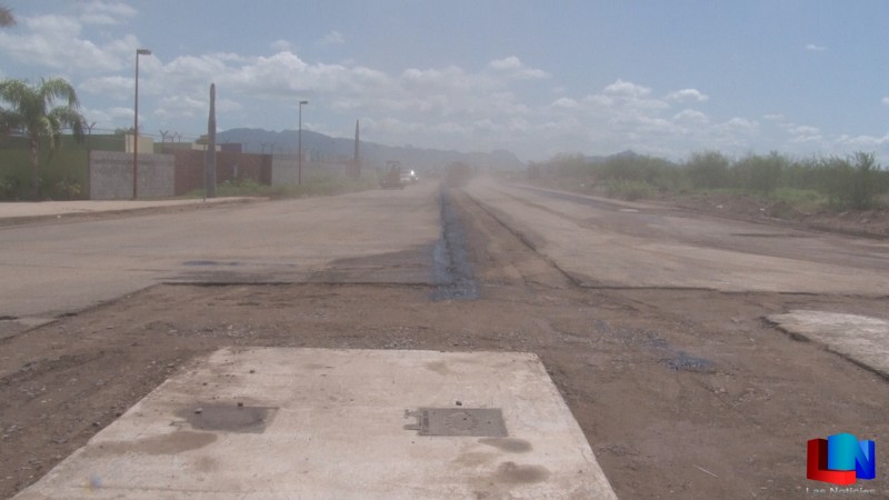 Limpian calle frente a Albergue