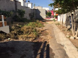 Piden reparación de la calle Varsovia en Lomas del Sol