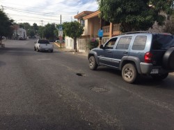 Un hoyo  por Avenida del Parque