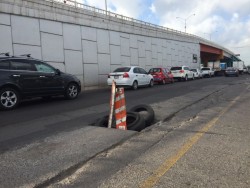 Alcantarilla sin rejilla por un lateral en el puente Gas Valle