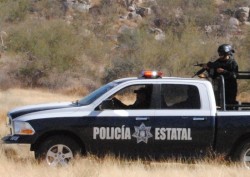 Encuentran cuerpo semienterrado