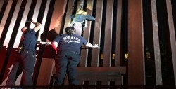 Rescatan a mexicana atorada en muro fronterizo de Arizona