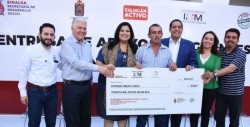 Entregan  cheques para  apoyar a migrantes