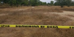 Encuentran el cadáver de una persona envuelto en lonas